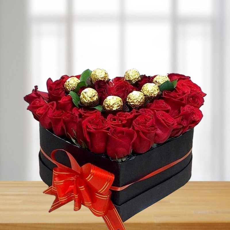 Arreglo de Rosas en Caja Corazón con Chocolates Ferrero Rocher - Elegancia Pura